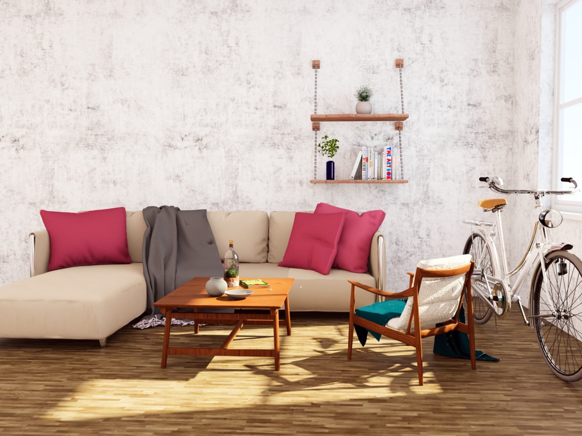 Диван и велосипед стоят в комнате