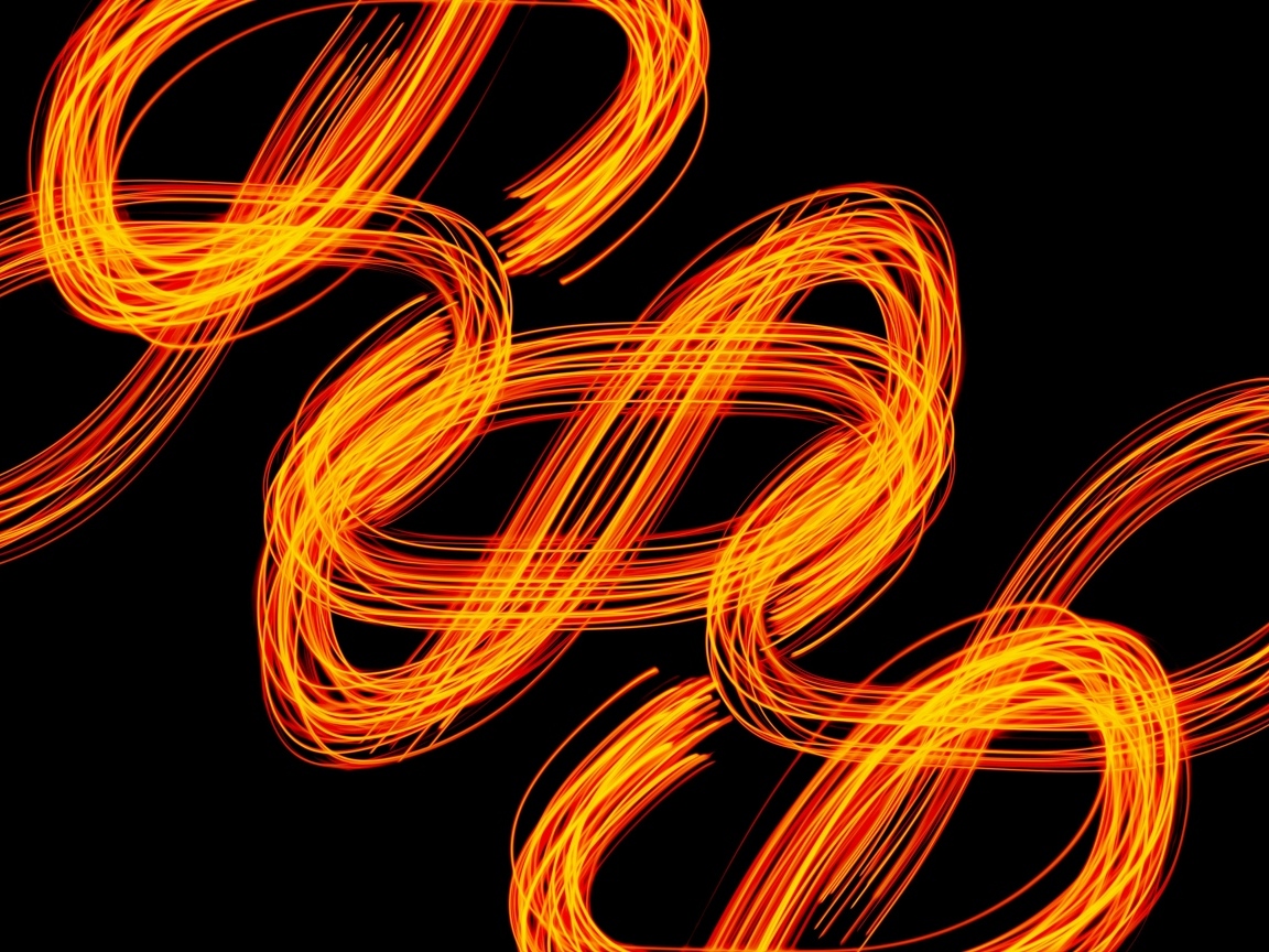 Огненные завитки на черном фоне