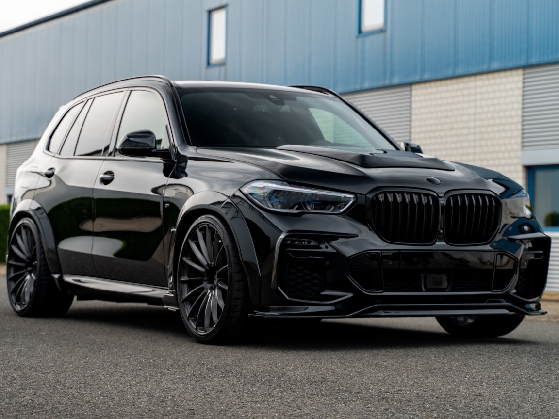 Черный автомобиль Prior-Design PDG5XWB Widebody Aerodynamic Kit