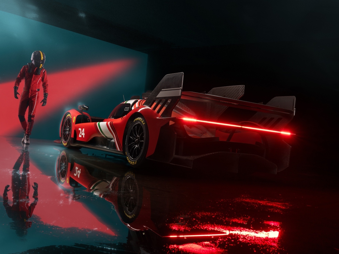 Красный спортивный автомобиль Ferrari 499P Modificata готовится к гонке