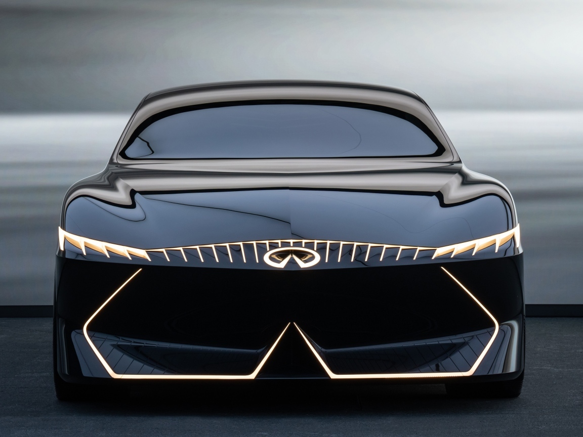 Красивый вид спереди на автомобиль Infiniti Vision Qe 2023 года