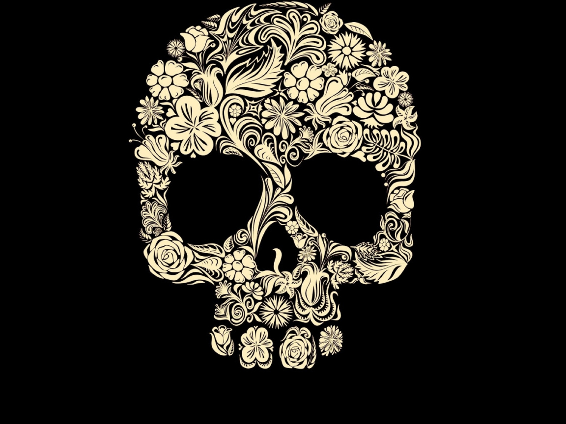Череп из цветов на черном фоне