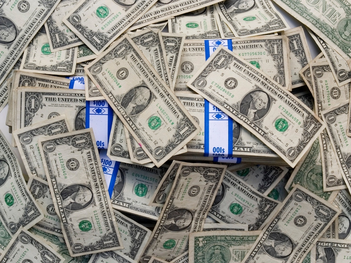 Много купюр в один доллар крупным планом