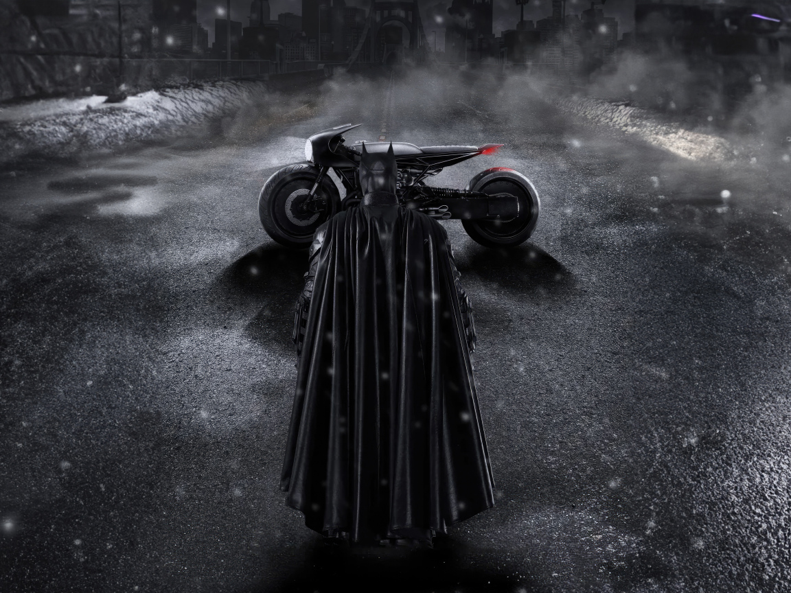Бэтмен в черном плаще с мотоциклом