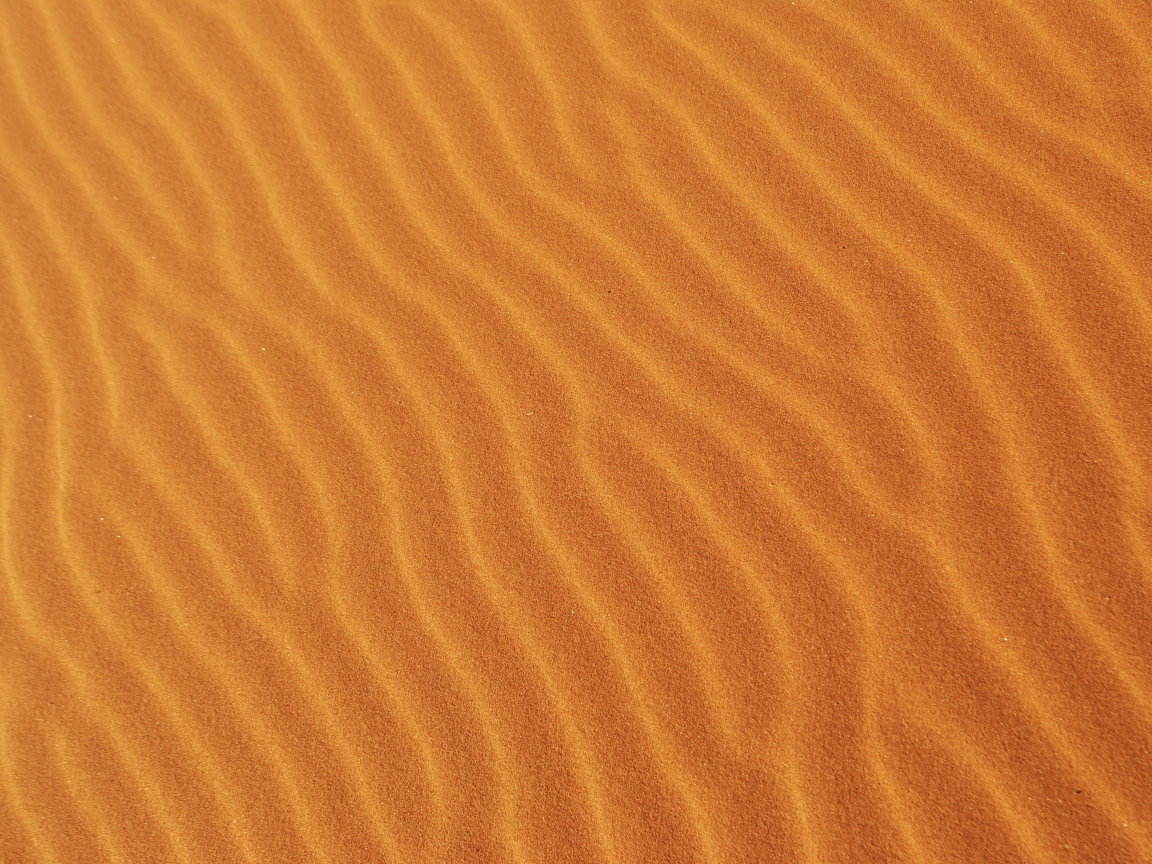 Волнистый горячий песок пустыни крупным планом