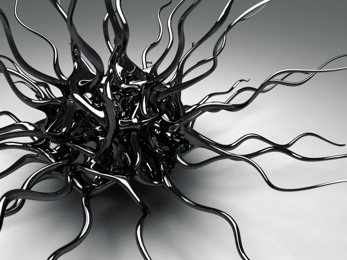 Черный металлический сплав на сером фоне