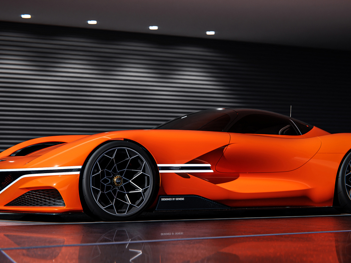 Быстрый оранжевый автомобиль Genesis X Gran Berlinetta вид сбоку