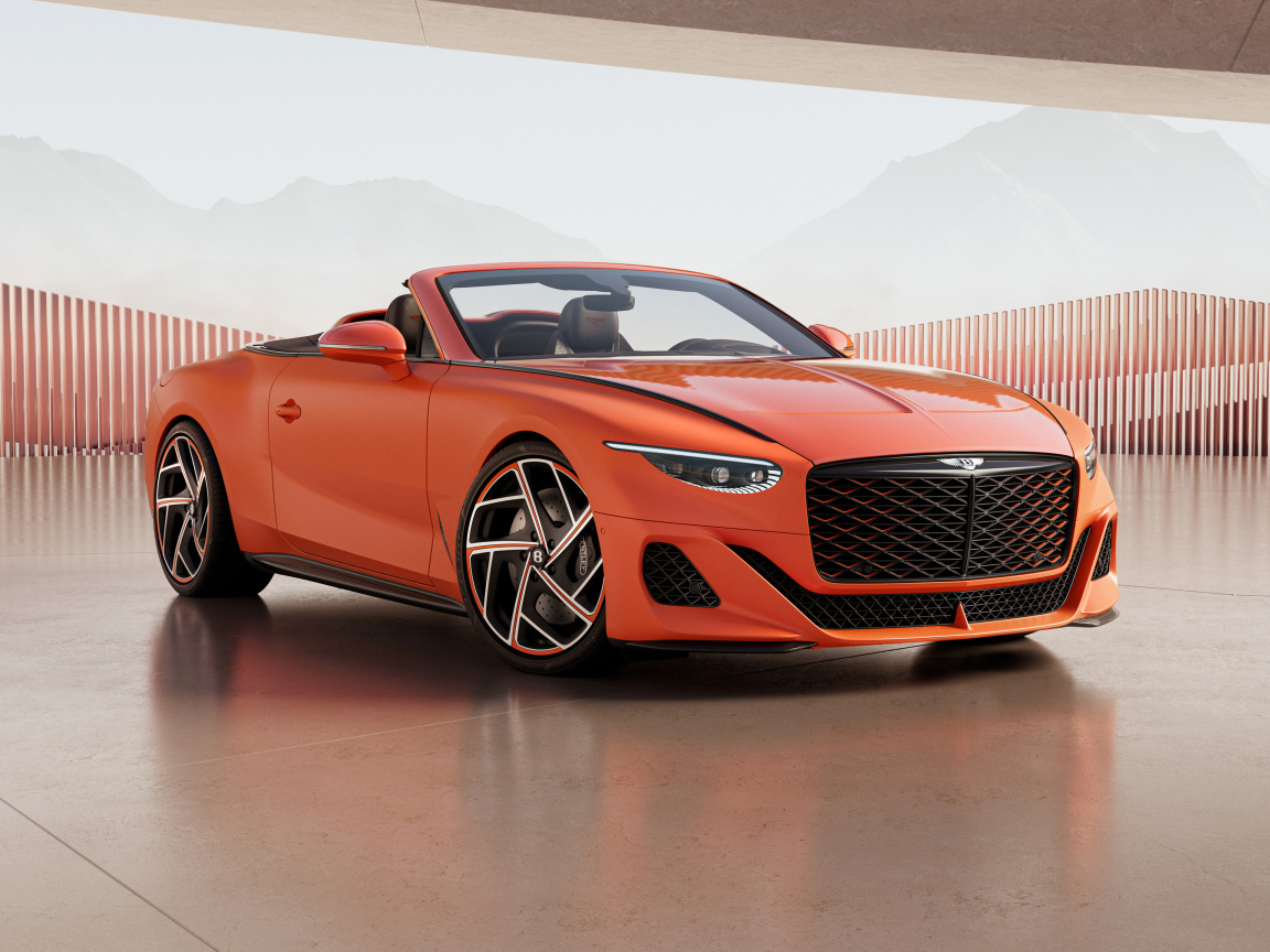 Красный автомобиль Bentley Mulliner Batur Convertible 2024 года