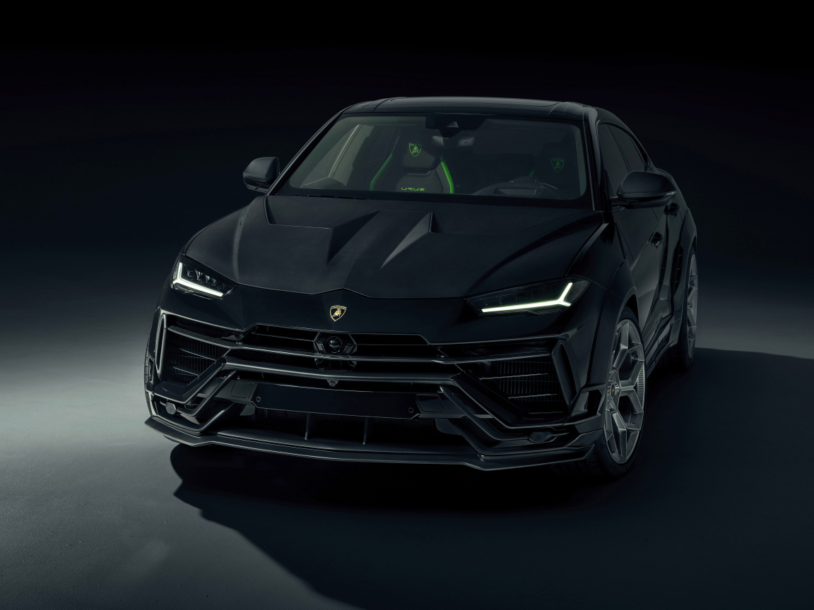 Автомобиль Lamborghini Urus на черном фоне