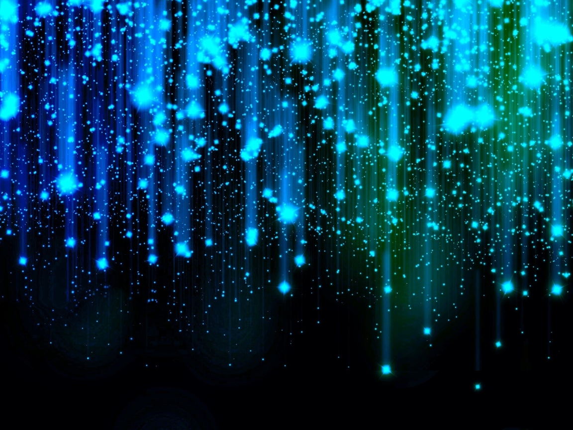 Яркие искры летят вниз на черном фоне