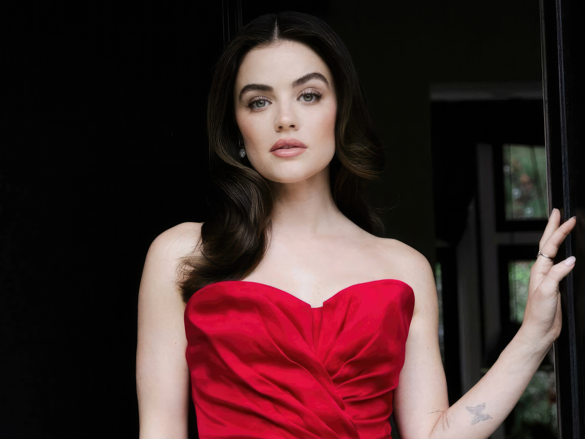 Beautiful brunette actress Lucy Hale in a red dress
