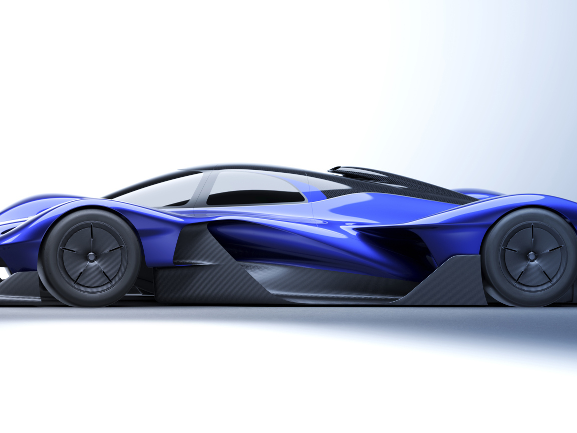 Вид сбоку на синий автомобиль Red Bull RB17 Prototype 2024 года