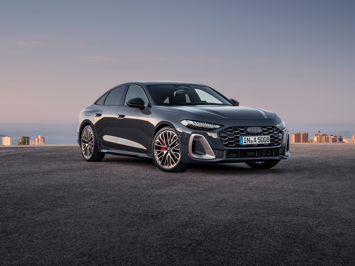 Автомобиль Audi A5 TFSI quattro S line 2024 года на фоне океана