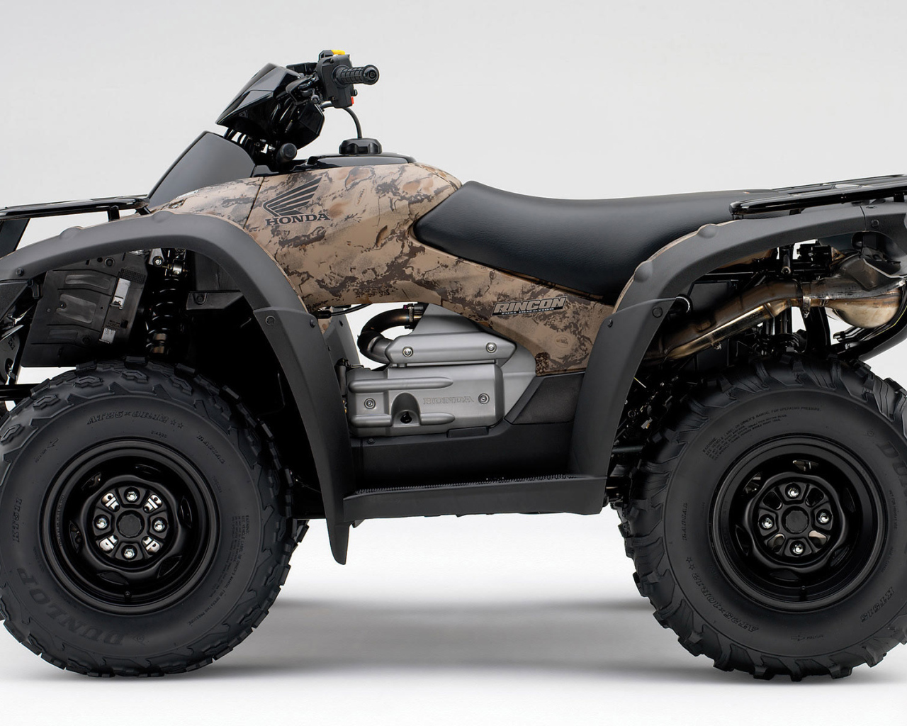 Коричневый Honda квадроцикл