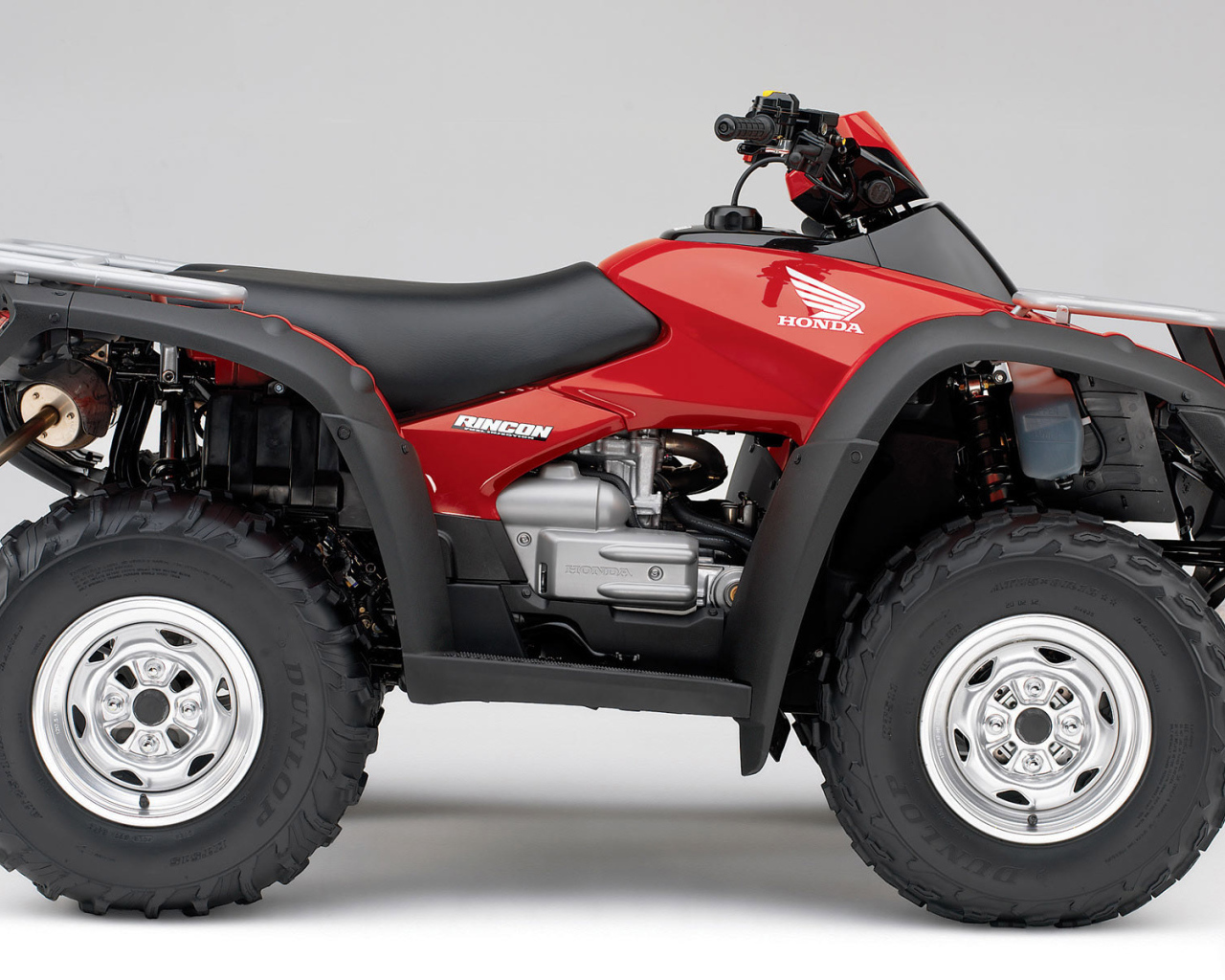 Красный Honda Rincon квадроцикл