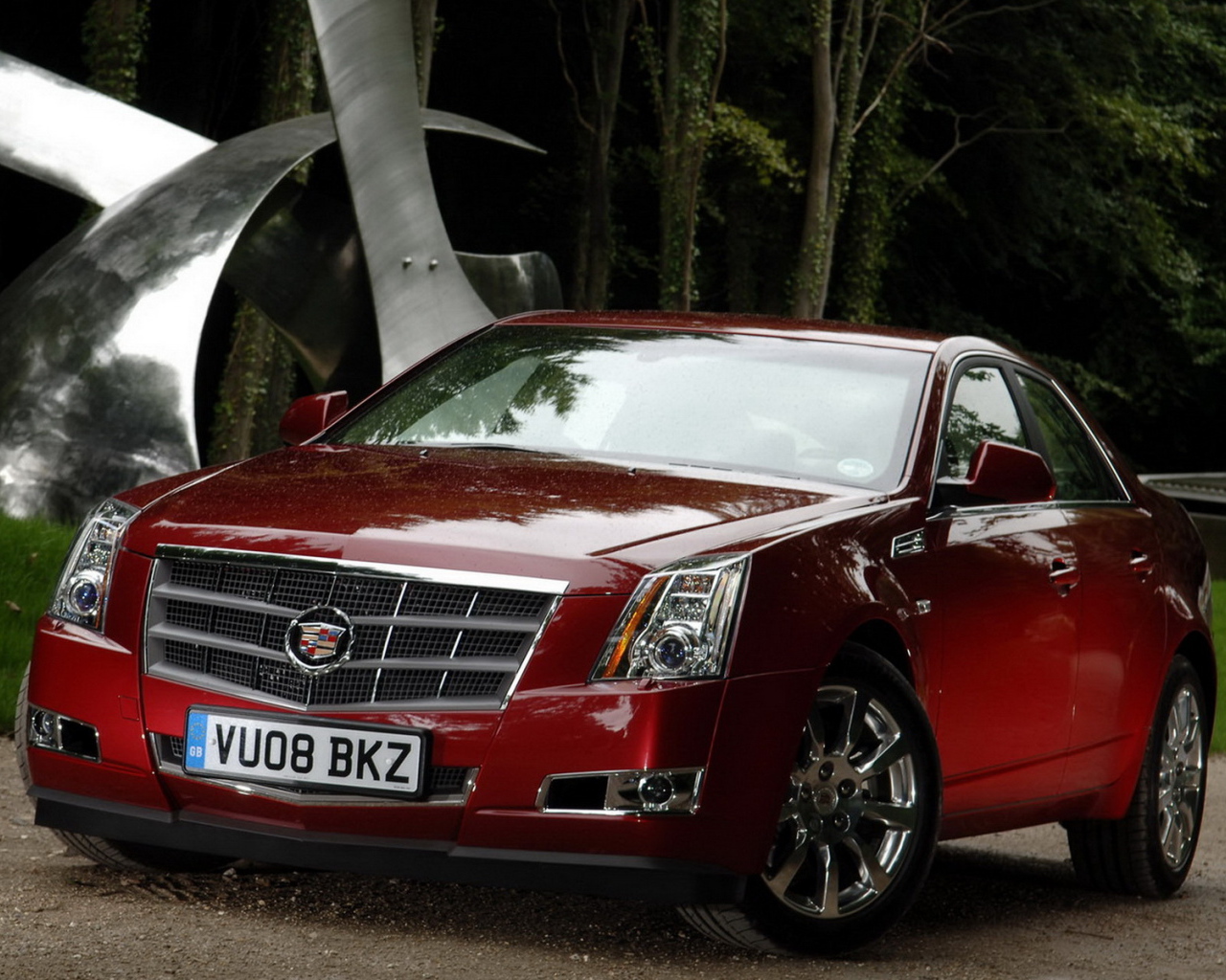 красный Кадиллак CTS