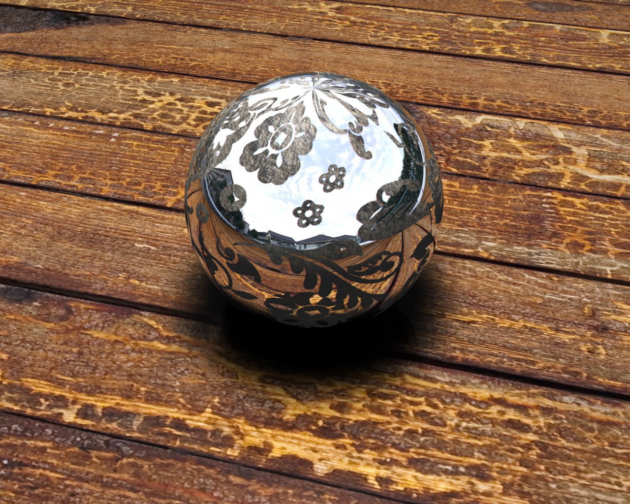 Блестящий шар на деревянном полу