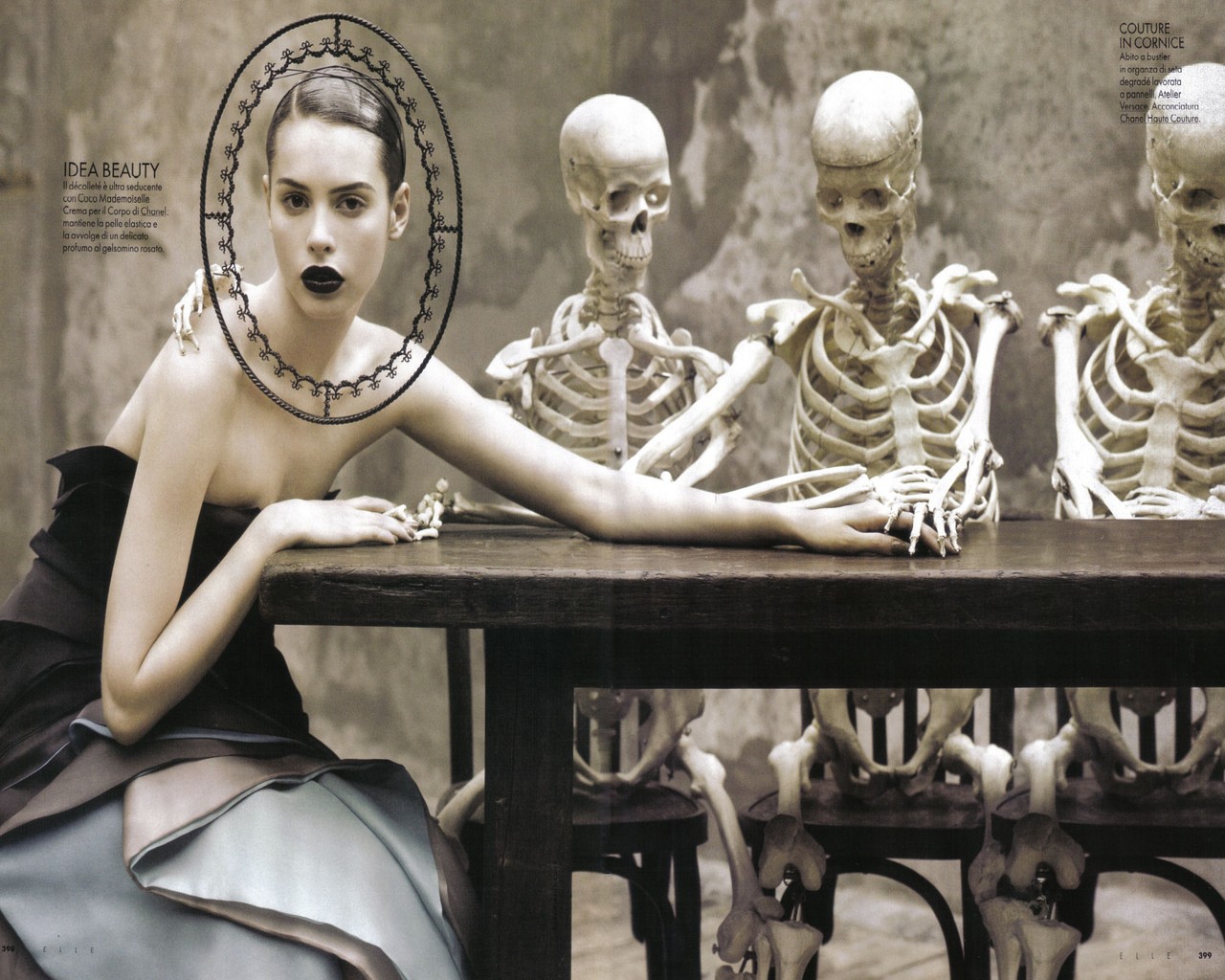 Девушка со скелетами за столом