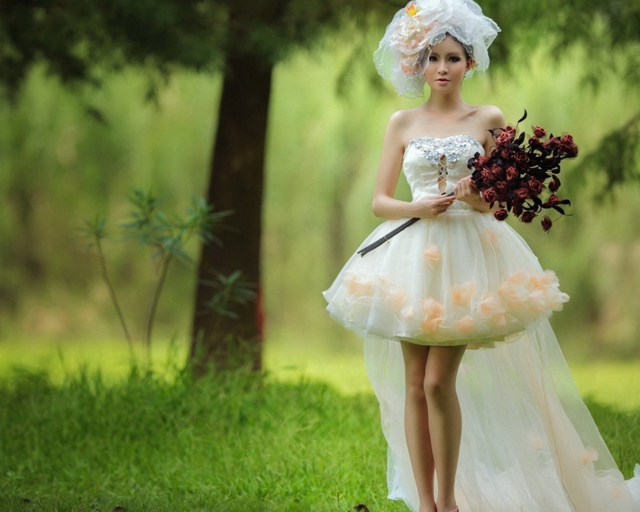 	 Bride with a bouquet of red