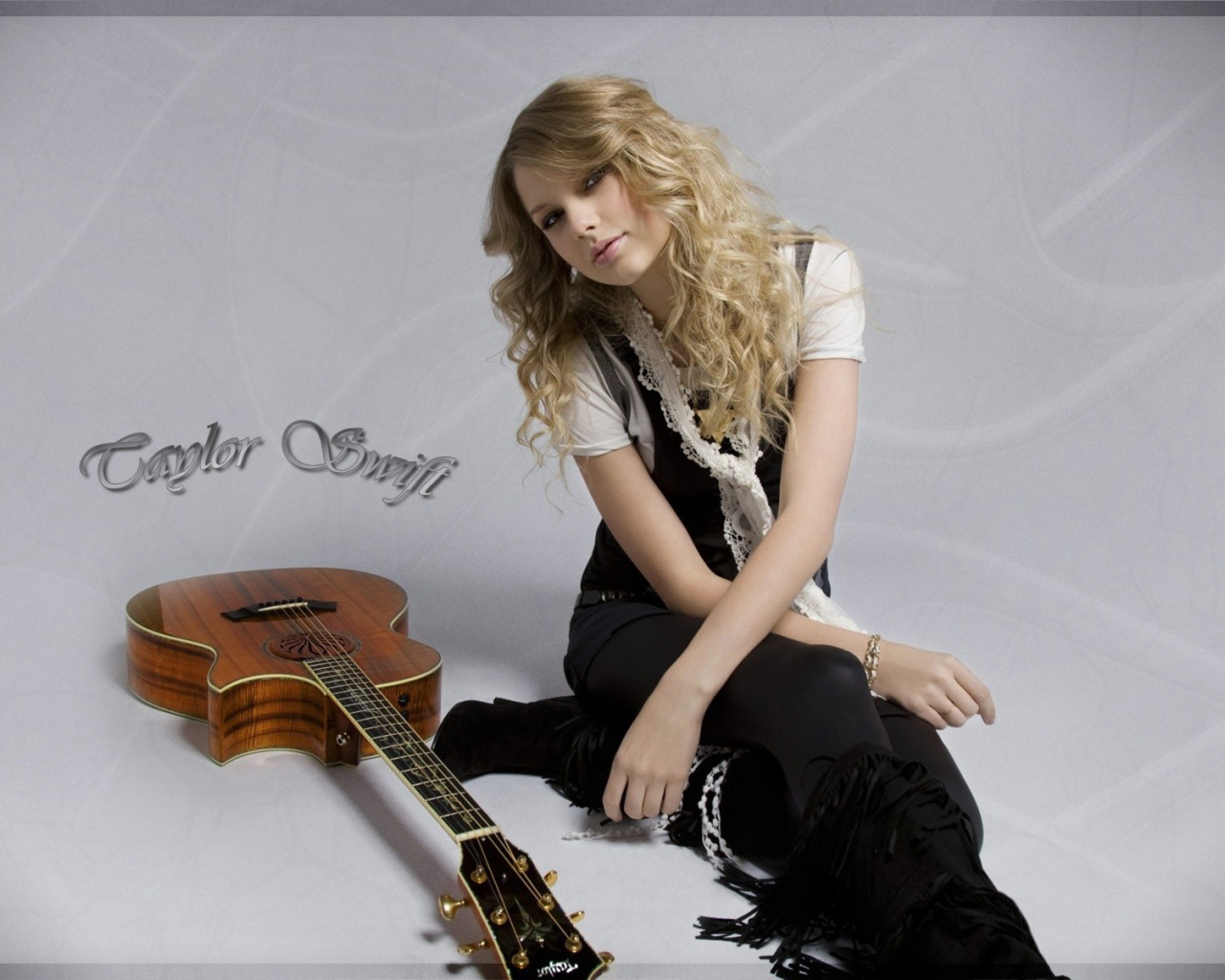 Тейлор с гитарой