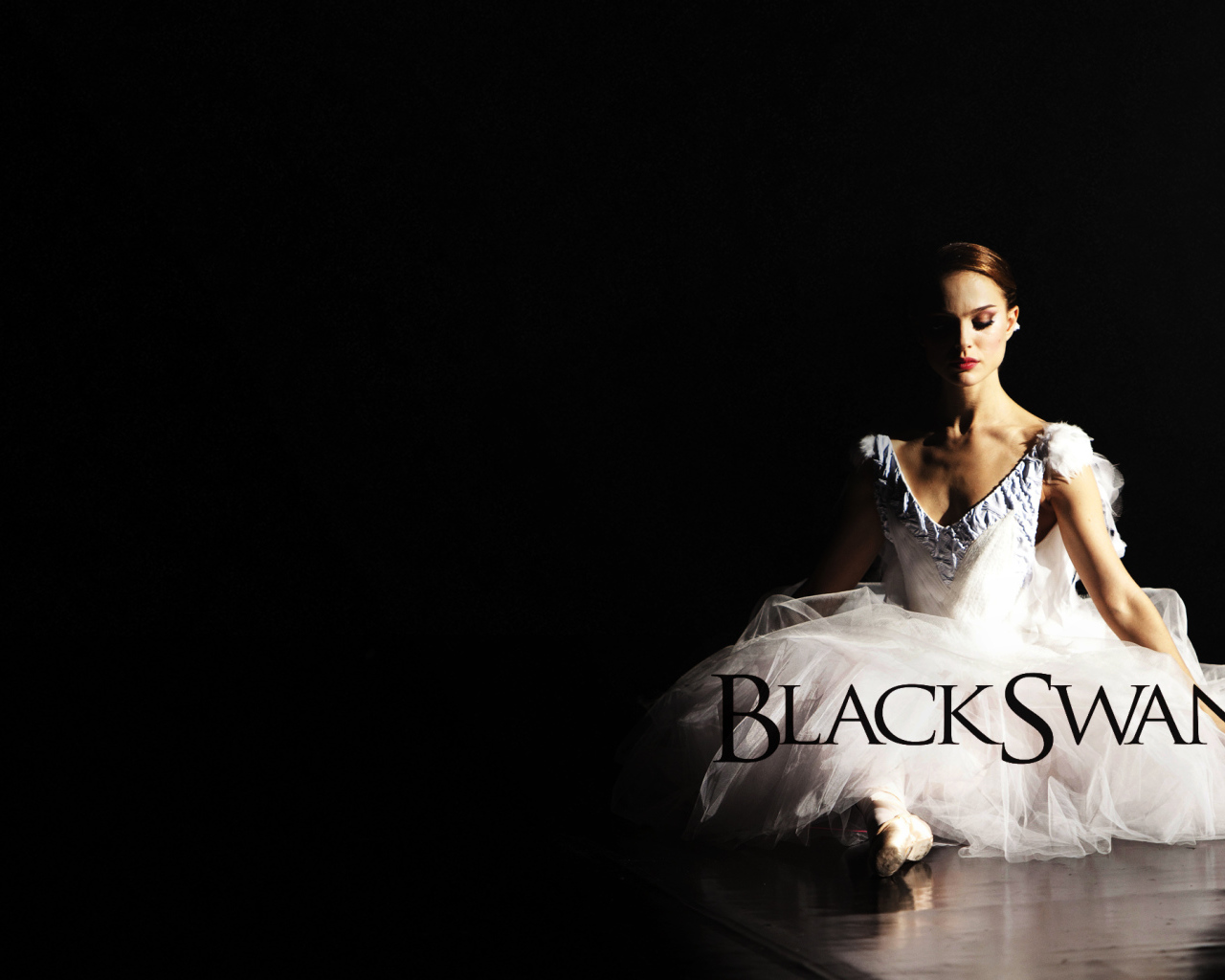 Балерина в образе белого лебедя