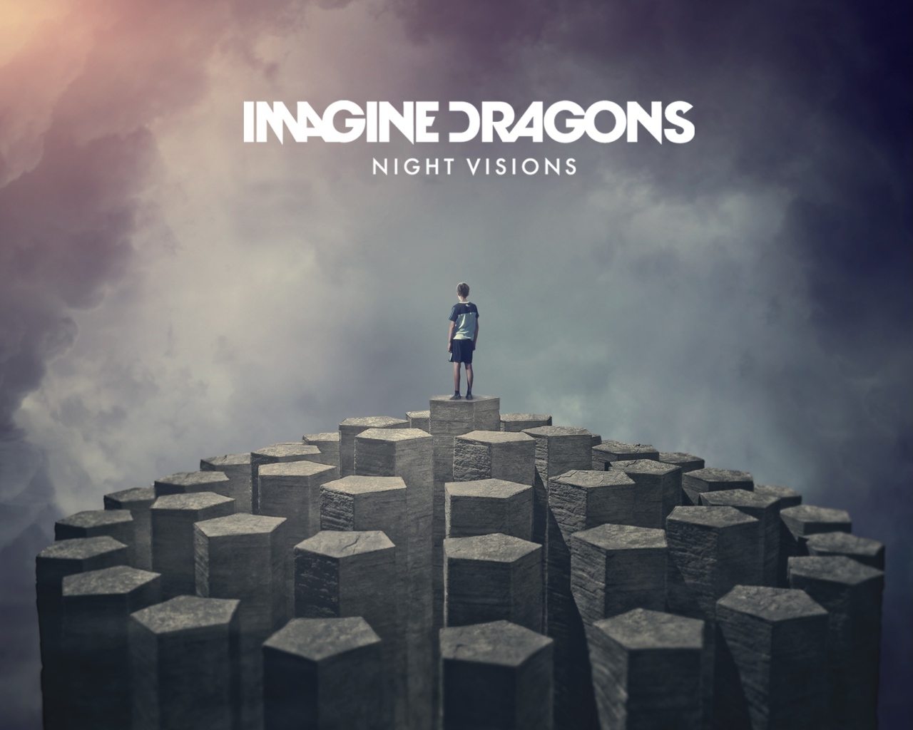 Imagine Dragons: человек на скале