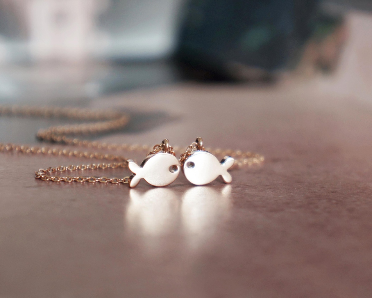 Кулон, рыбы