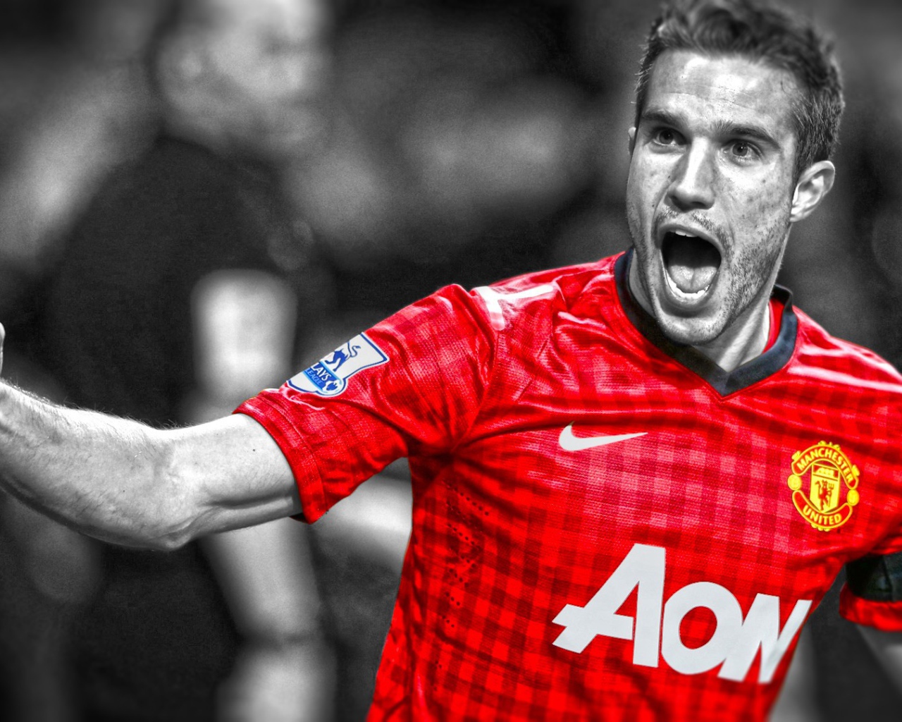 The attacker of Manchester United Robin van Persie celebrating victory