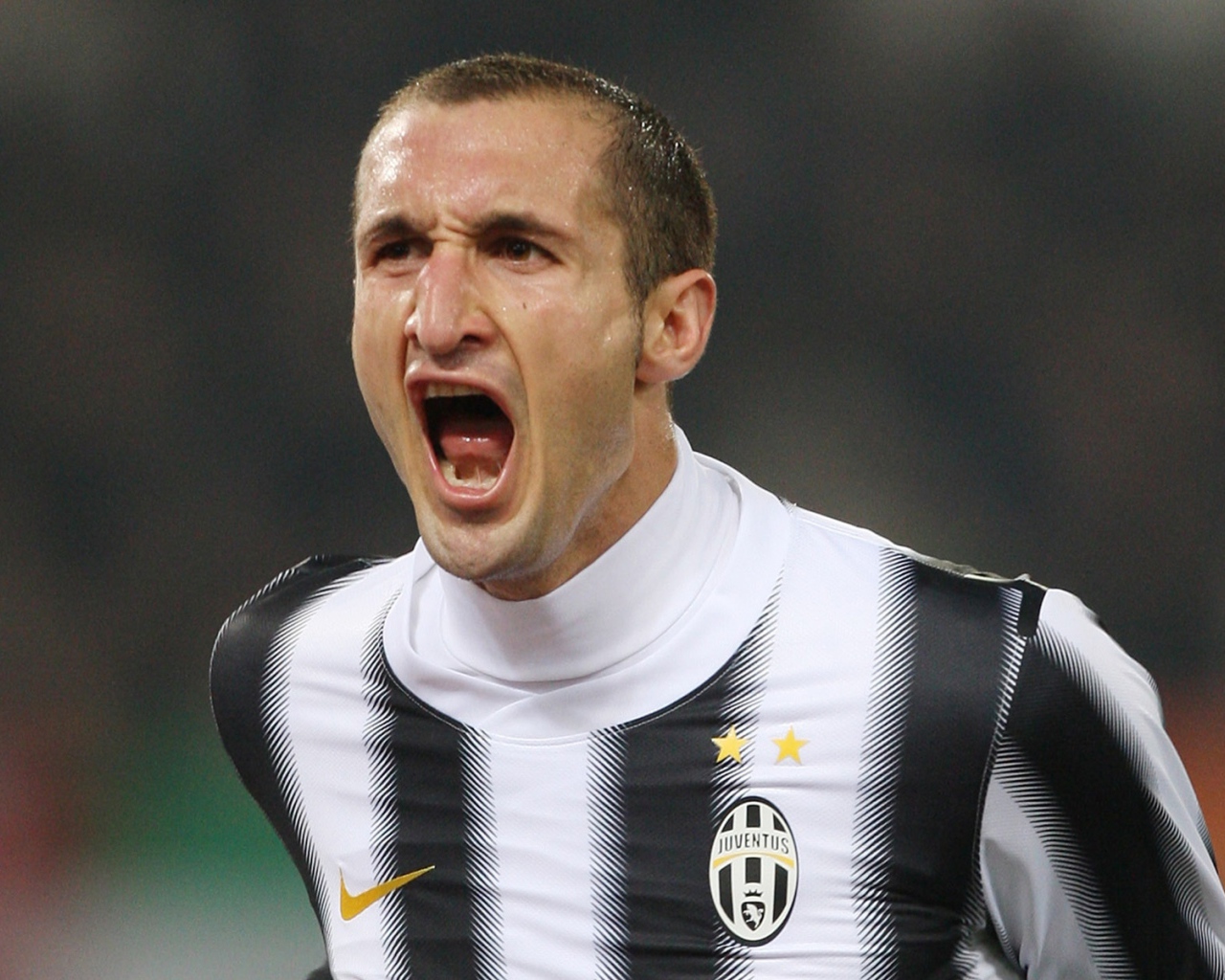 The football player of Juventus Giorgio Chiellini is shouting