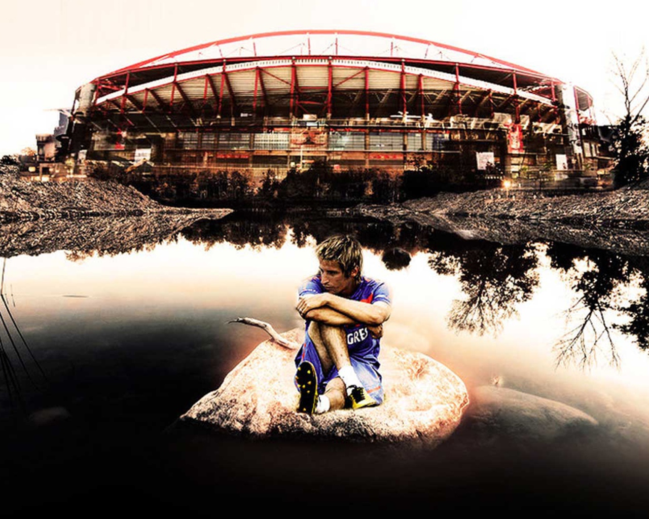  Игрок из Реал Мадрид Фабиу Коэнтрау сидит возле стадиона