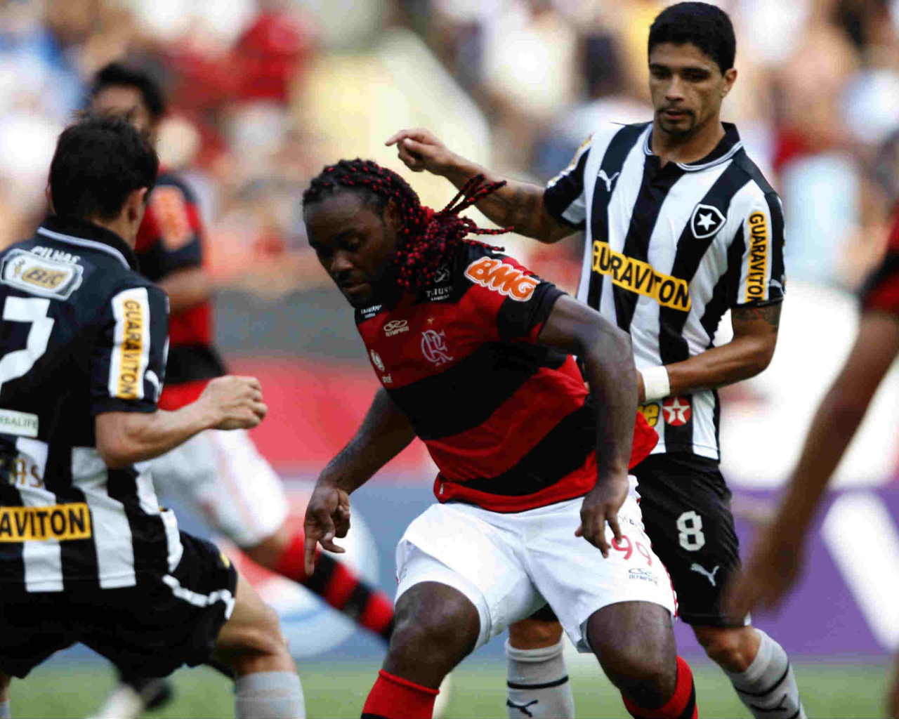The player of Shandong Luneng Vagner battling for the ball