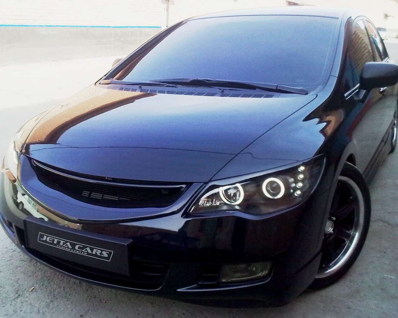 Фото автомобиля Honda Civic 4D