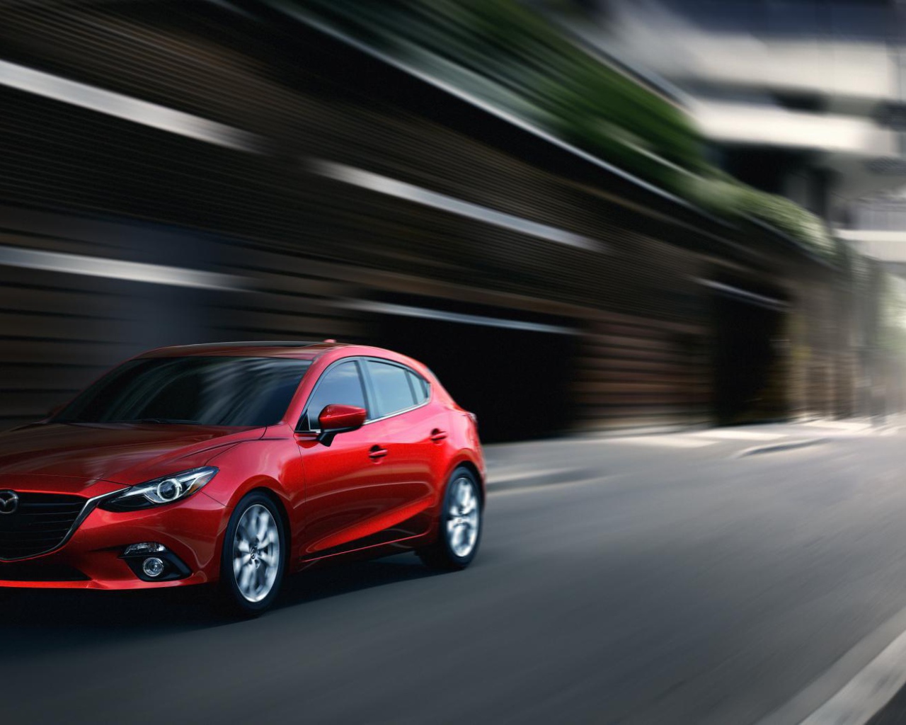 Новый автомобиль Mazda 3 2014