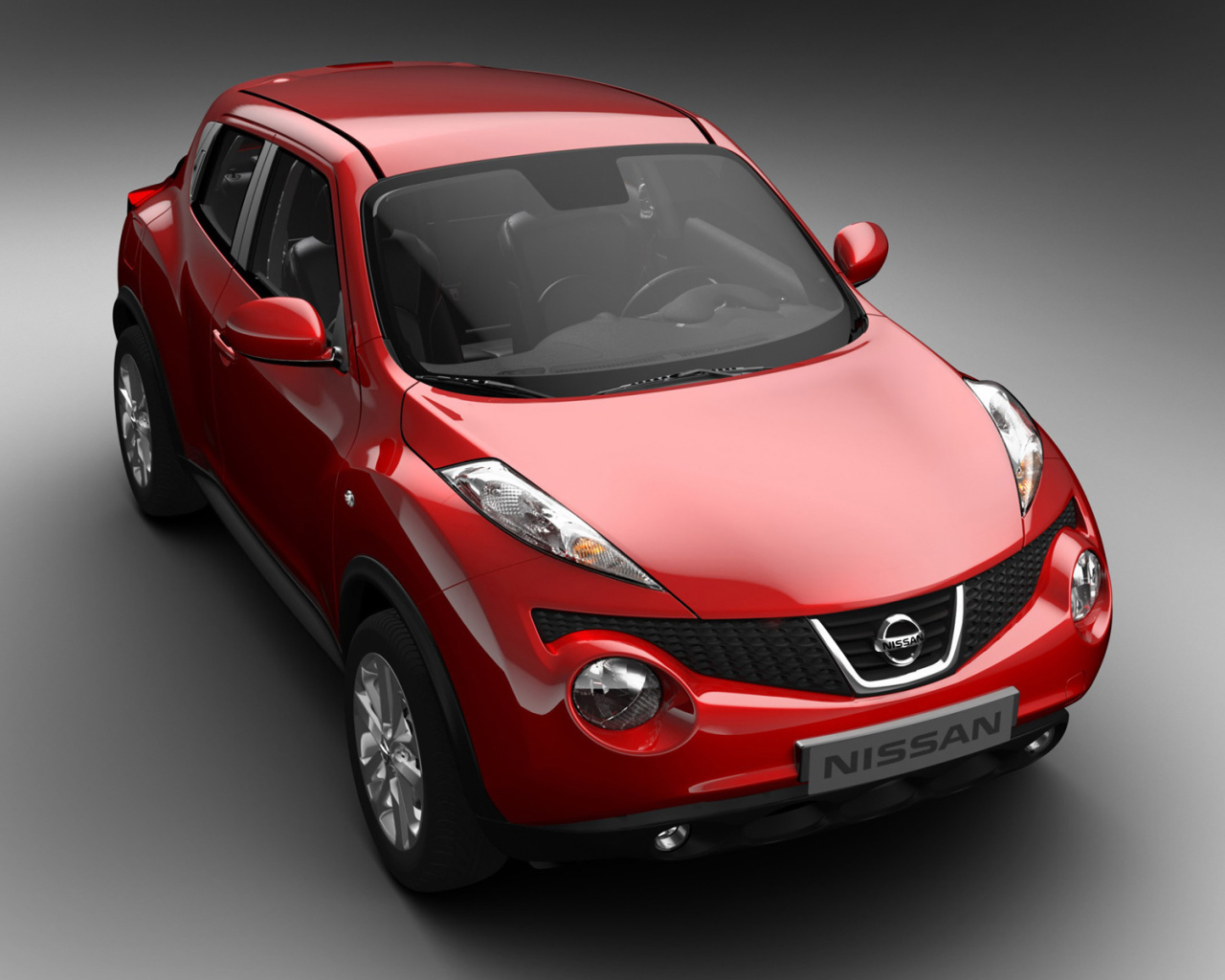 Автомобиль Nissan Juke на дороге