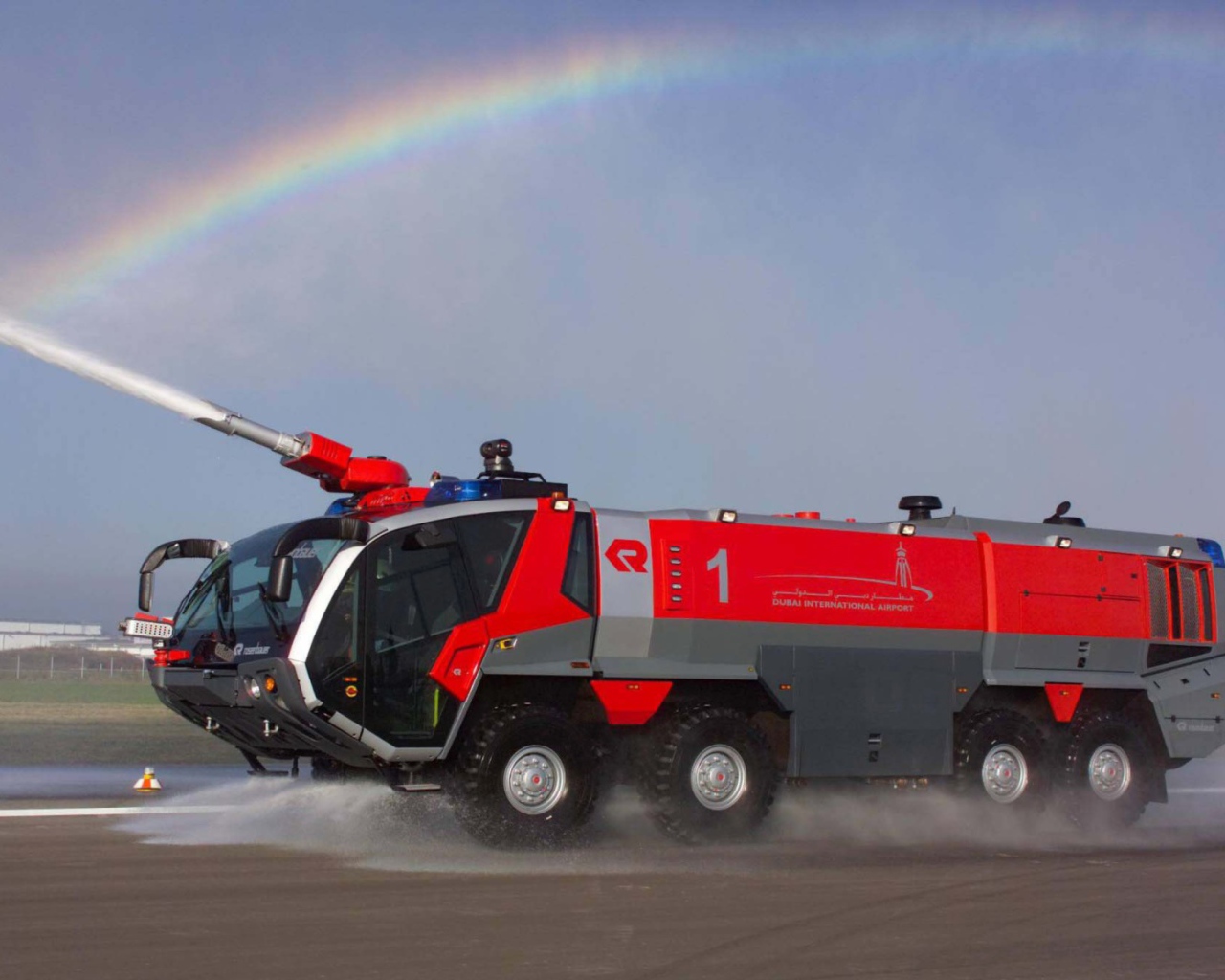 	   Rainbow over the fire engine