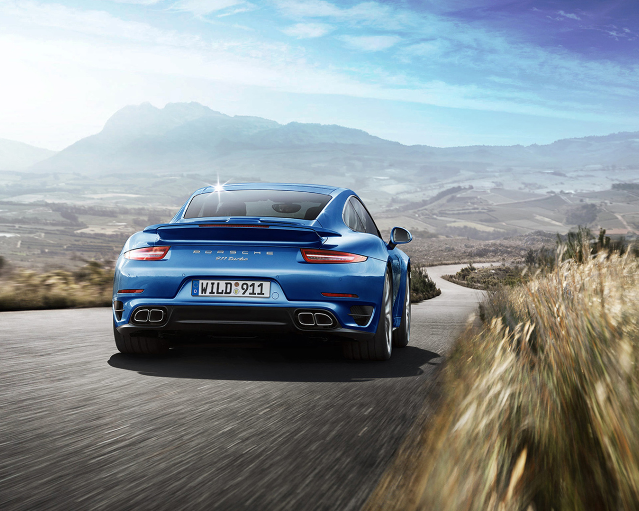 Новый автомобиль Porsche 911 Turbo 2014