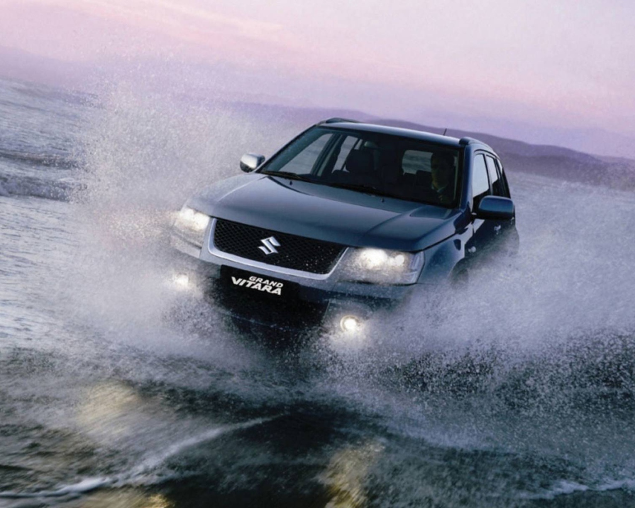 Надежная машина Suzuki Grand Vitara 2014