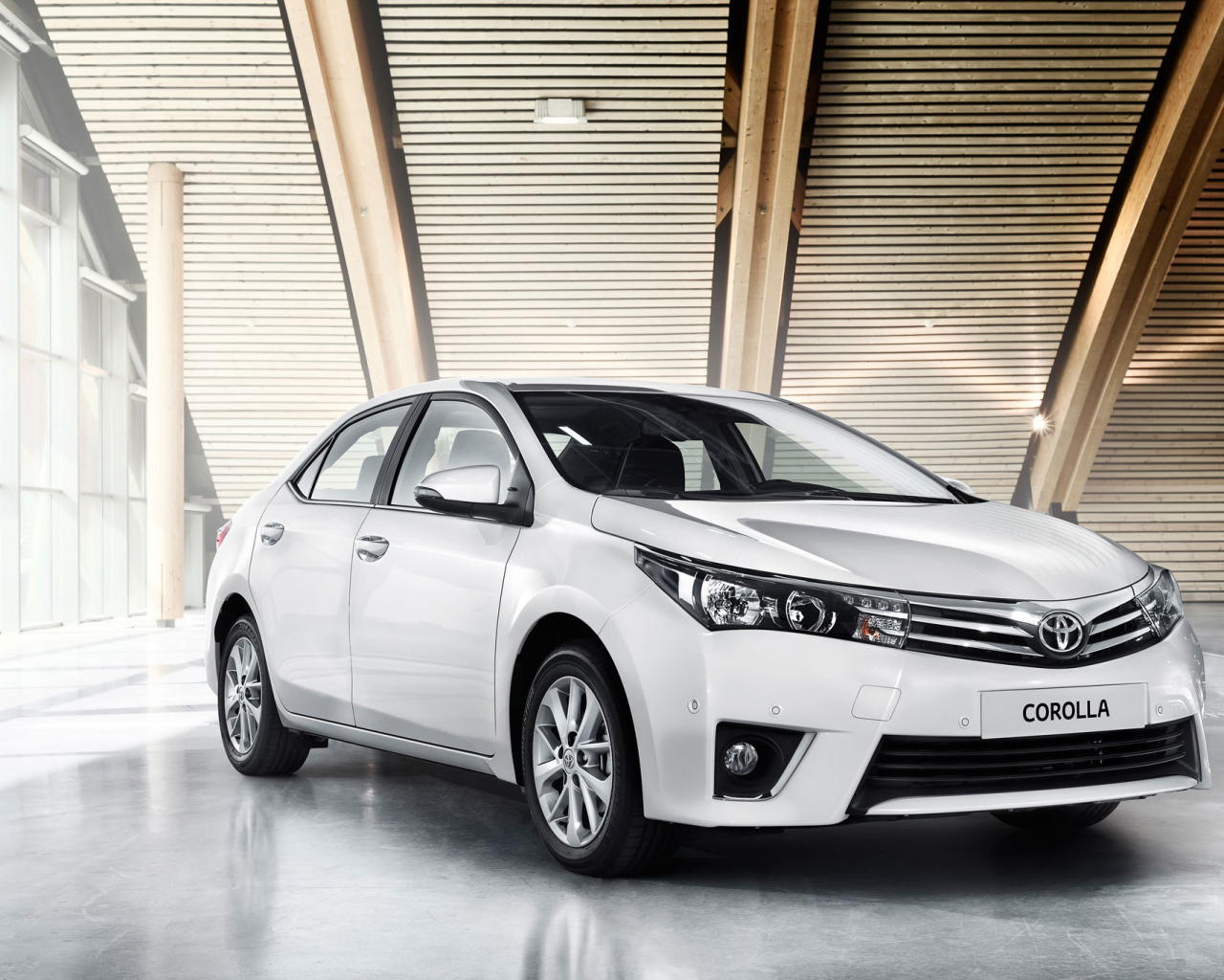 Надежная машина Toyota Corolla 2014