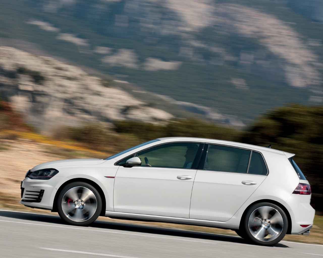 Фото автомобиля Golf GTI 2014 года