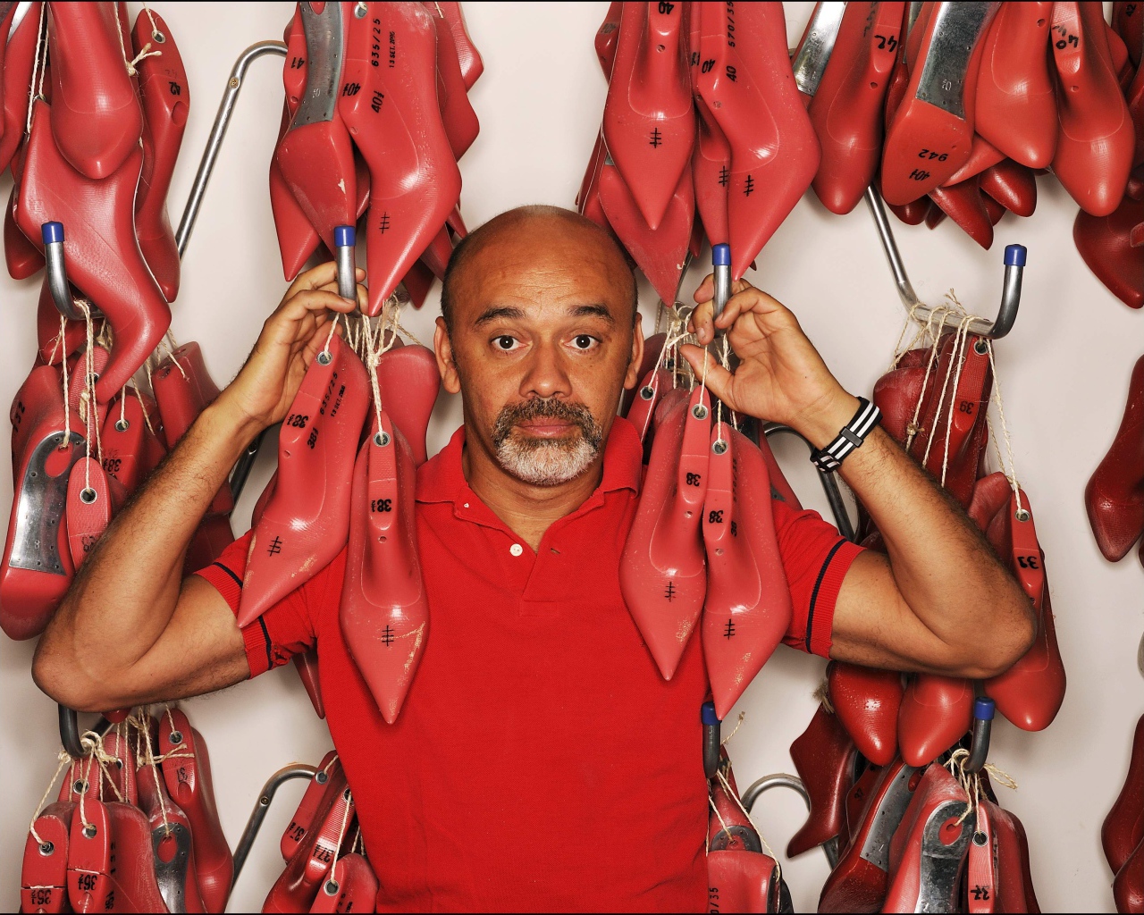 Известный модельер Christian Louboutin