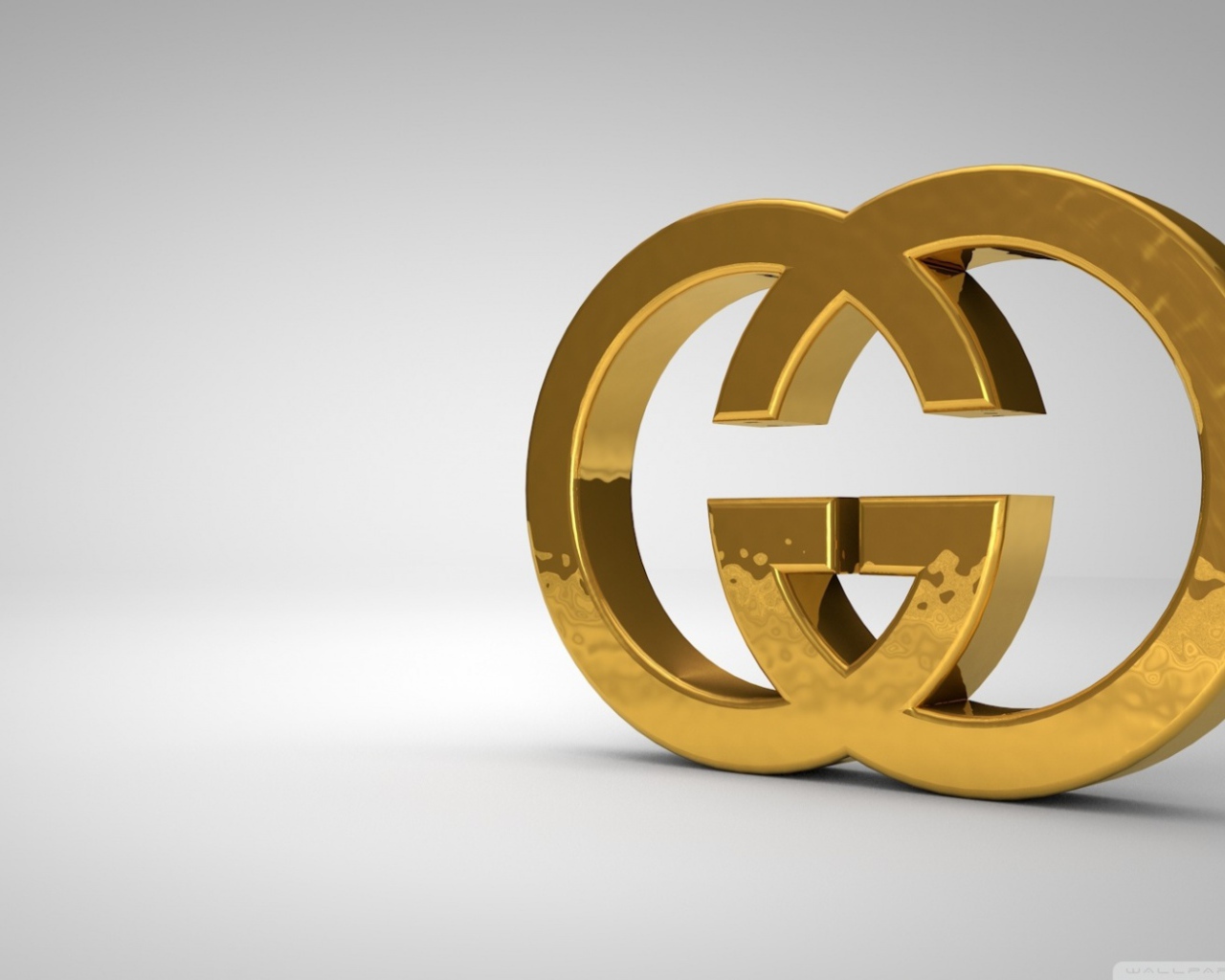 Золотой символ Gucci