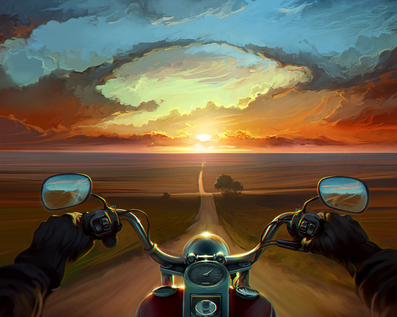 Мотоциклист едет на закат