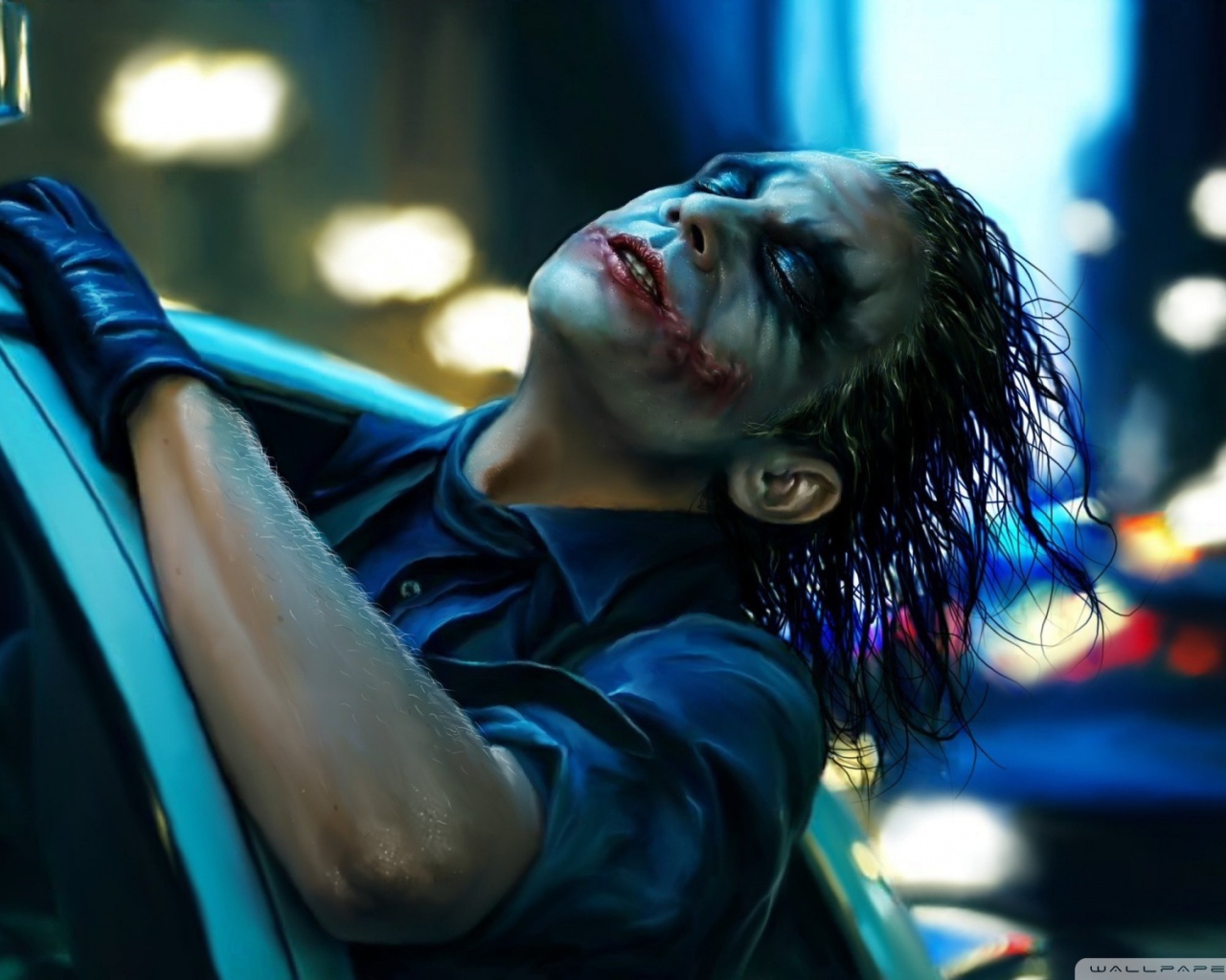 Джокер в полицейском автомобиле