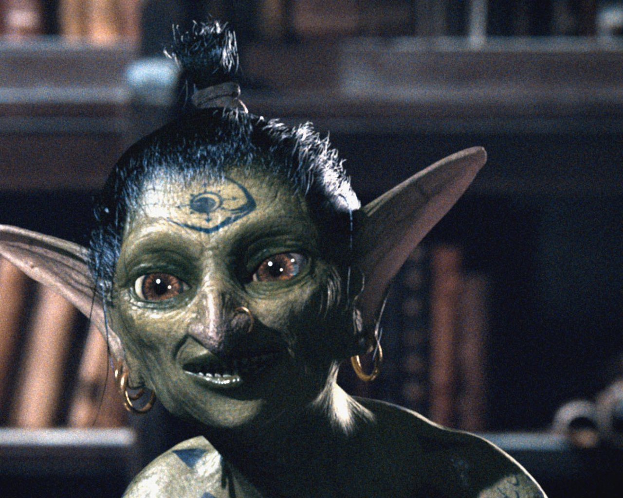 Инопланетянин с татуировкой на лбу