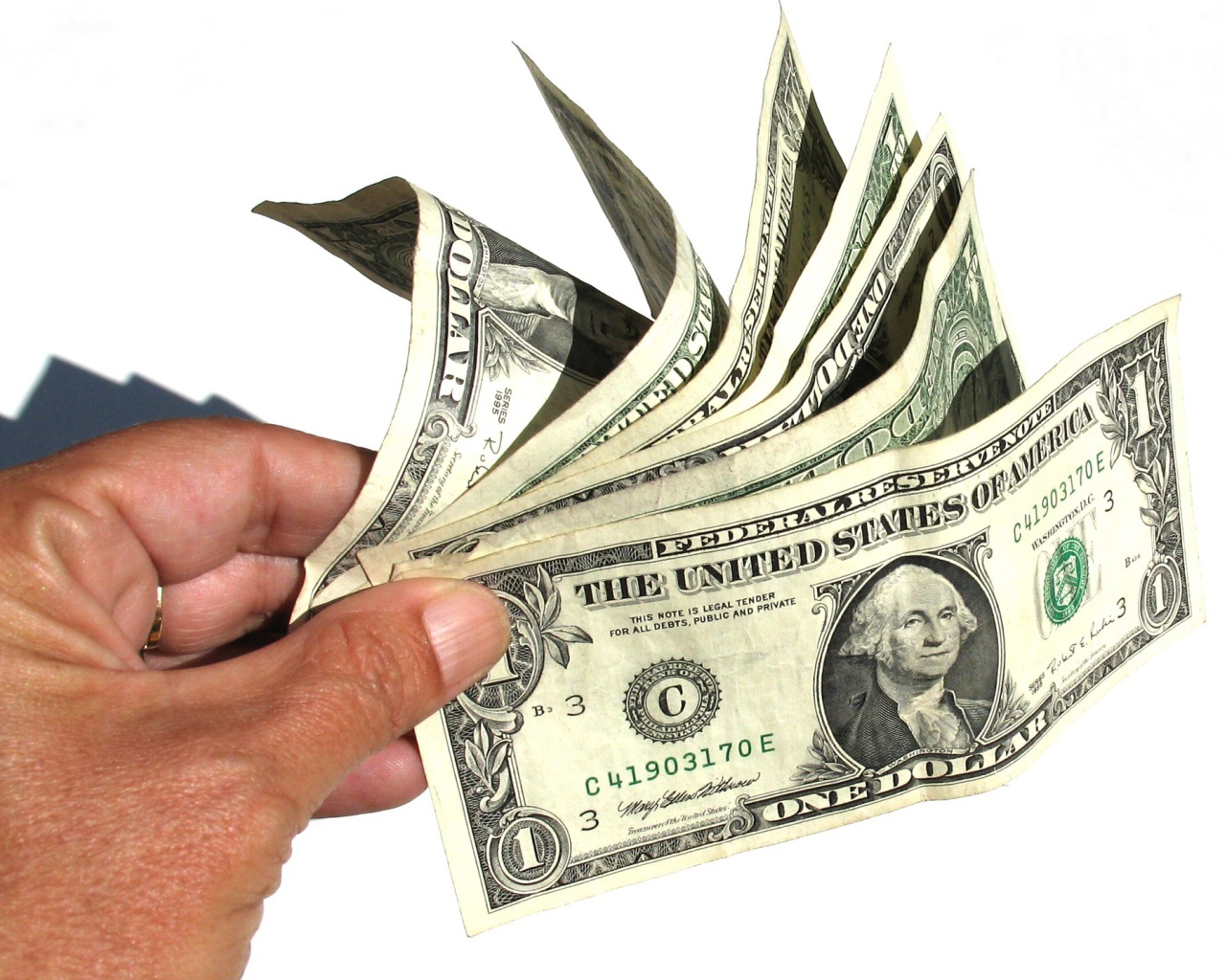 Доллары в руке