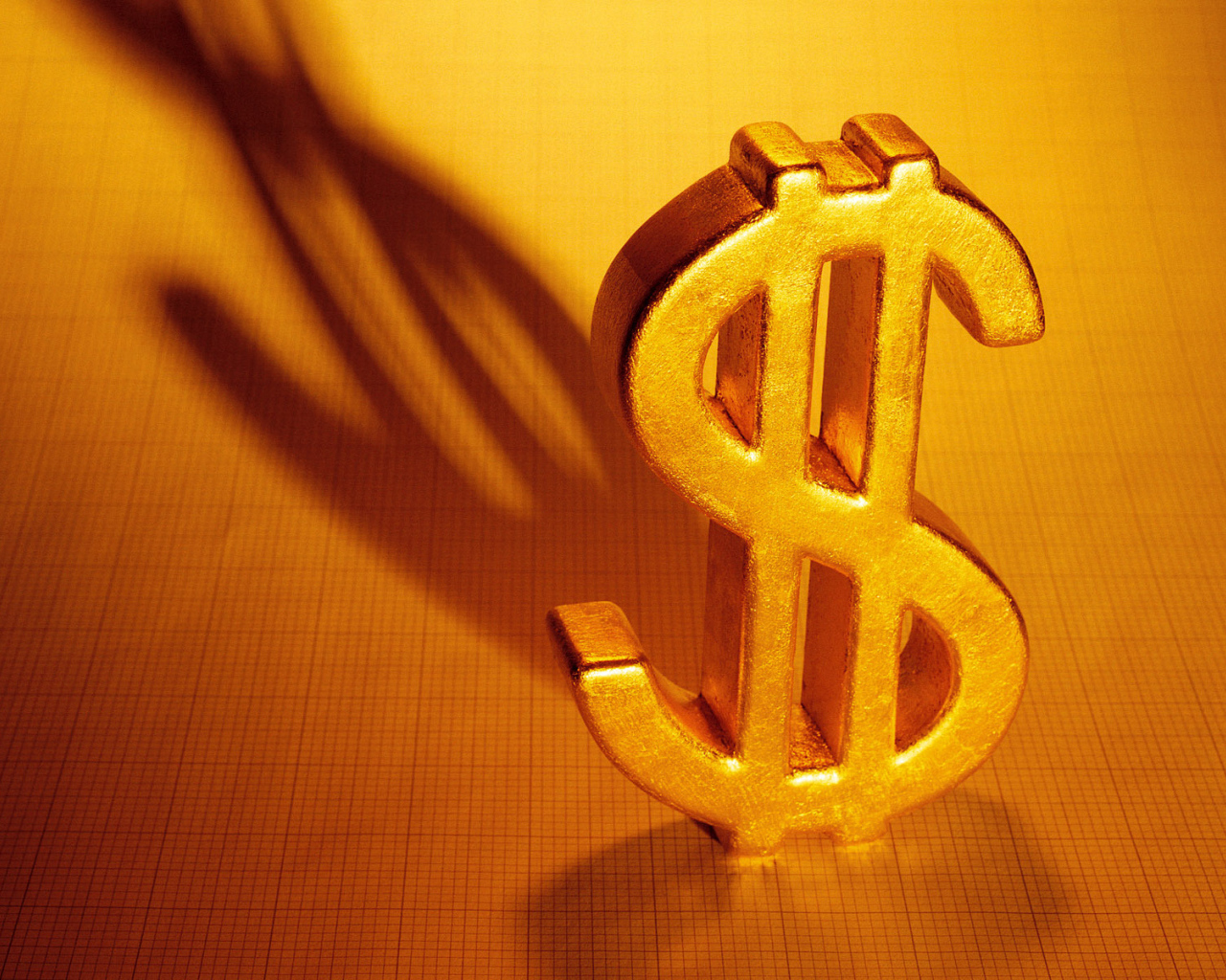Золотой знак доллара