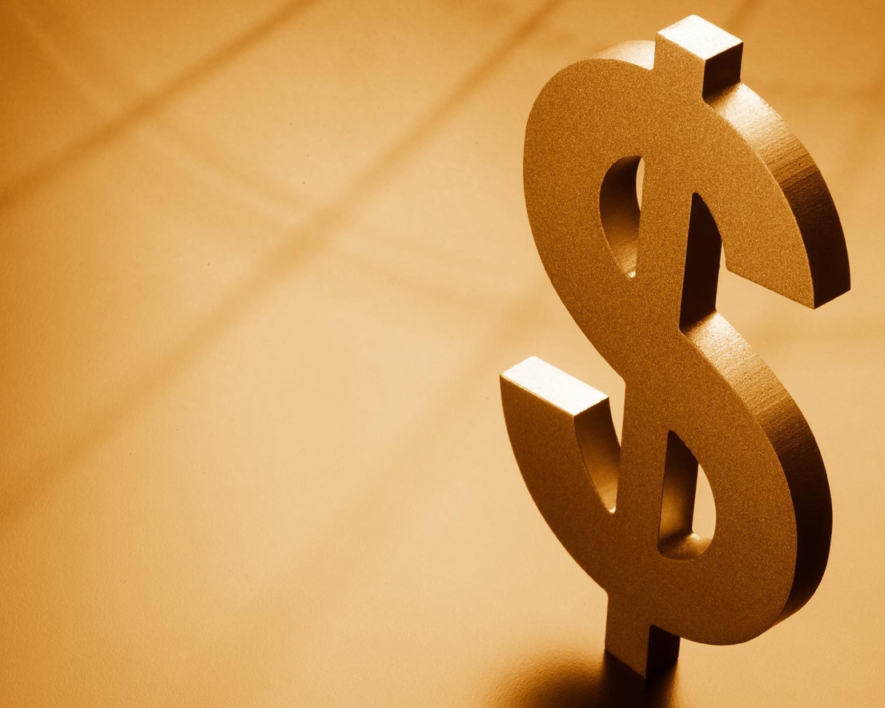 Металлический знак доллара