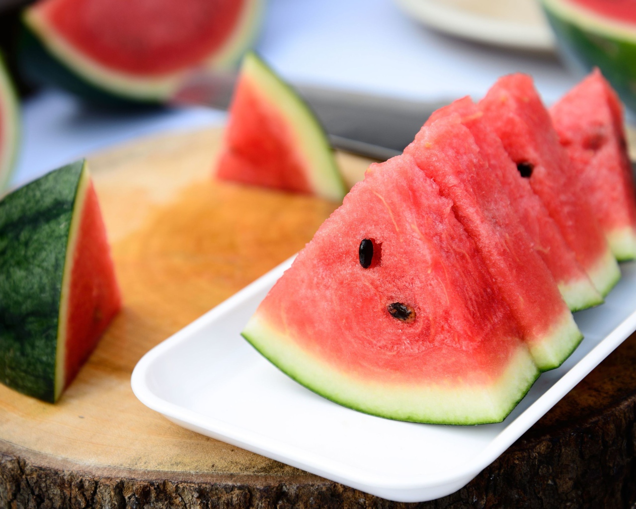 Plate of watermelon on a stump