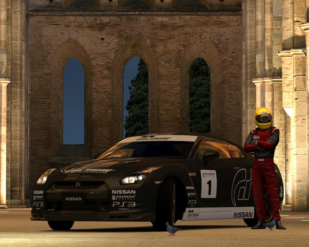 Гонщик у своей машины