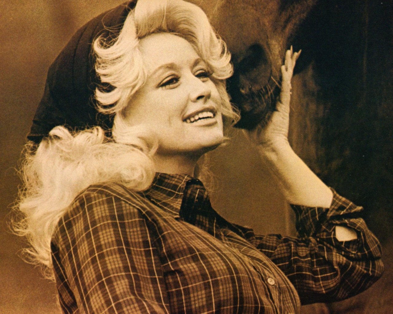 Популярная супермодель Долли Партон